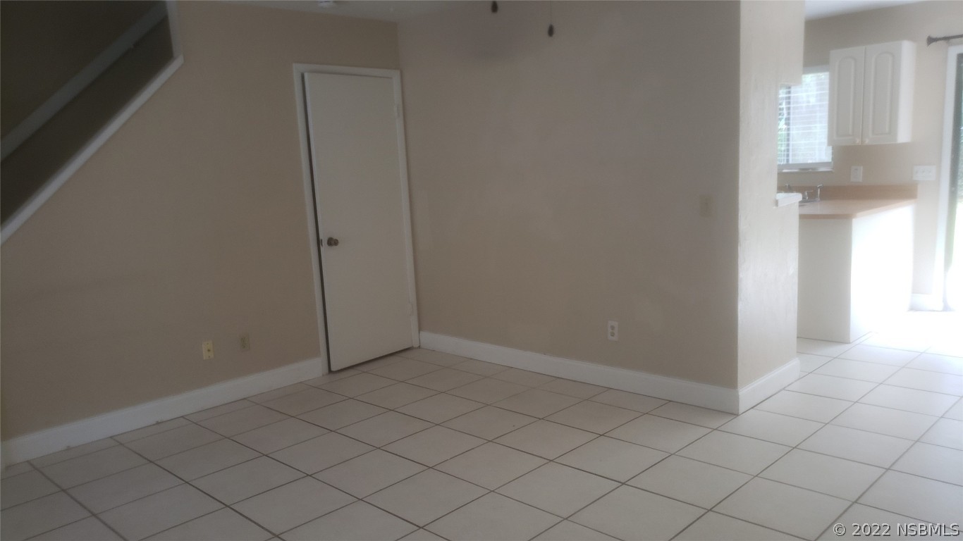 322 Canal Road, Unit 22 Edgewater, FL 32132 - Photo 4 of 17 a view of an empty room and window
