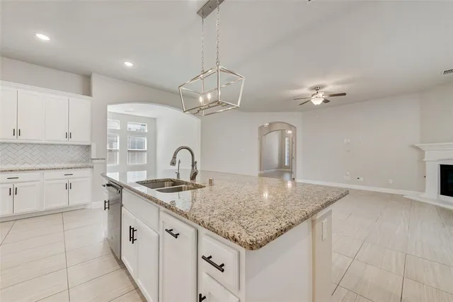 a view of a house with a yard and garage