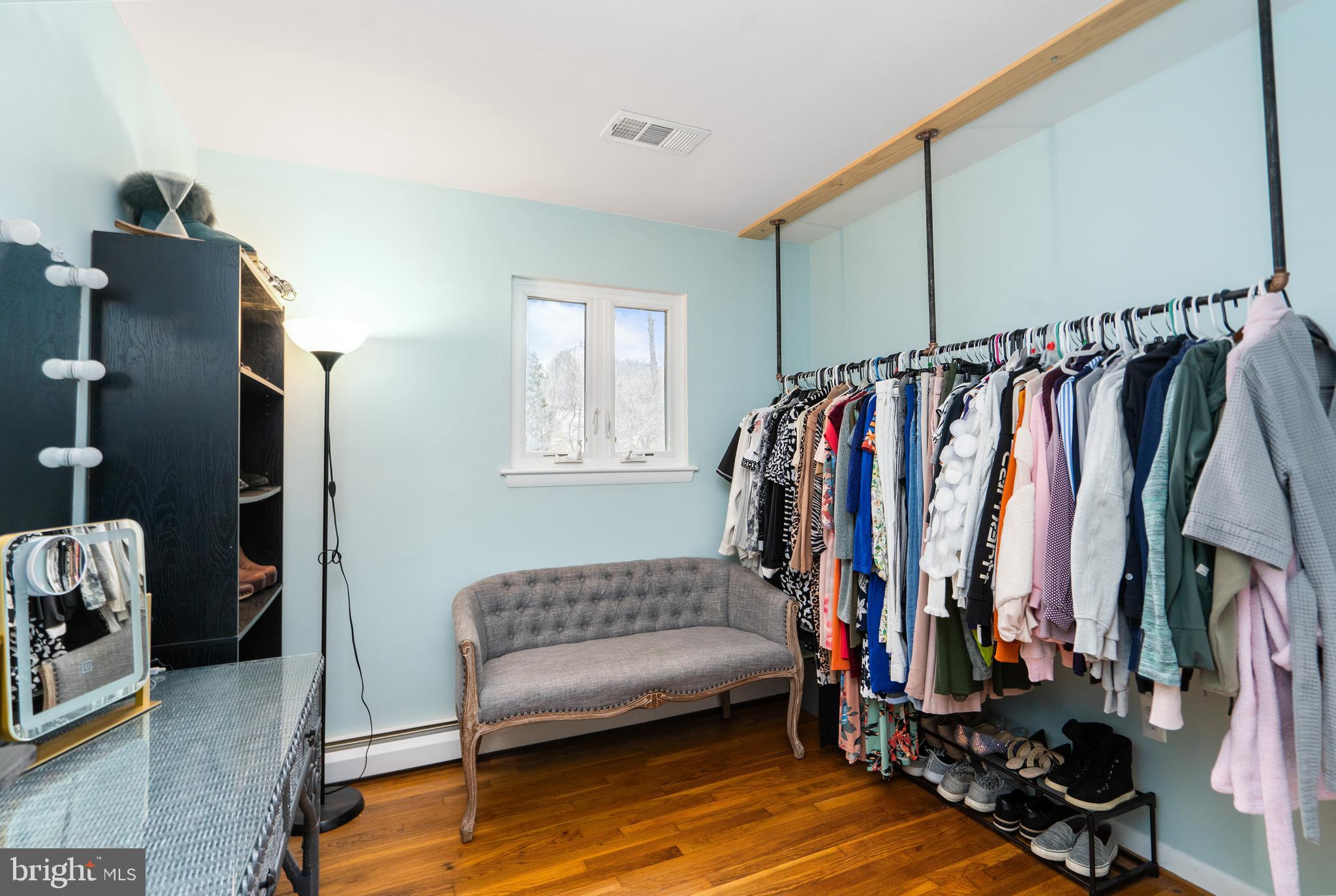 3605 Hoffman Mill Road Hampstead, MD 21074 - Photo 29 of 43 a view of walk in closet with clothes and shoes