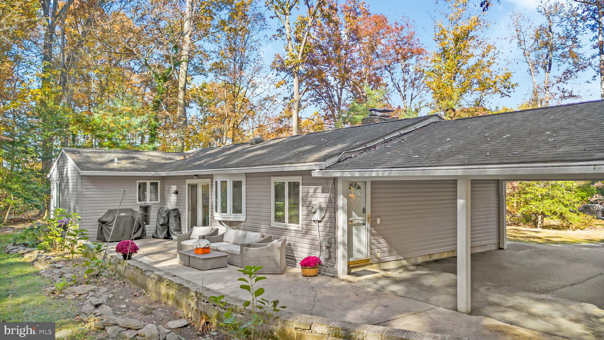 3605 Hoffman Mill Road Hampstead, MD 21074 - Photo 32 of 43 a view of backyard of house with seating space