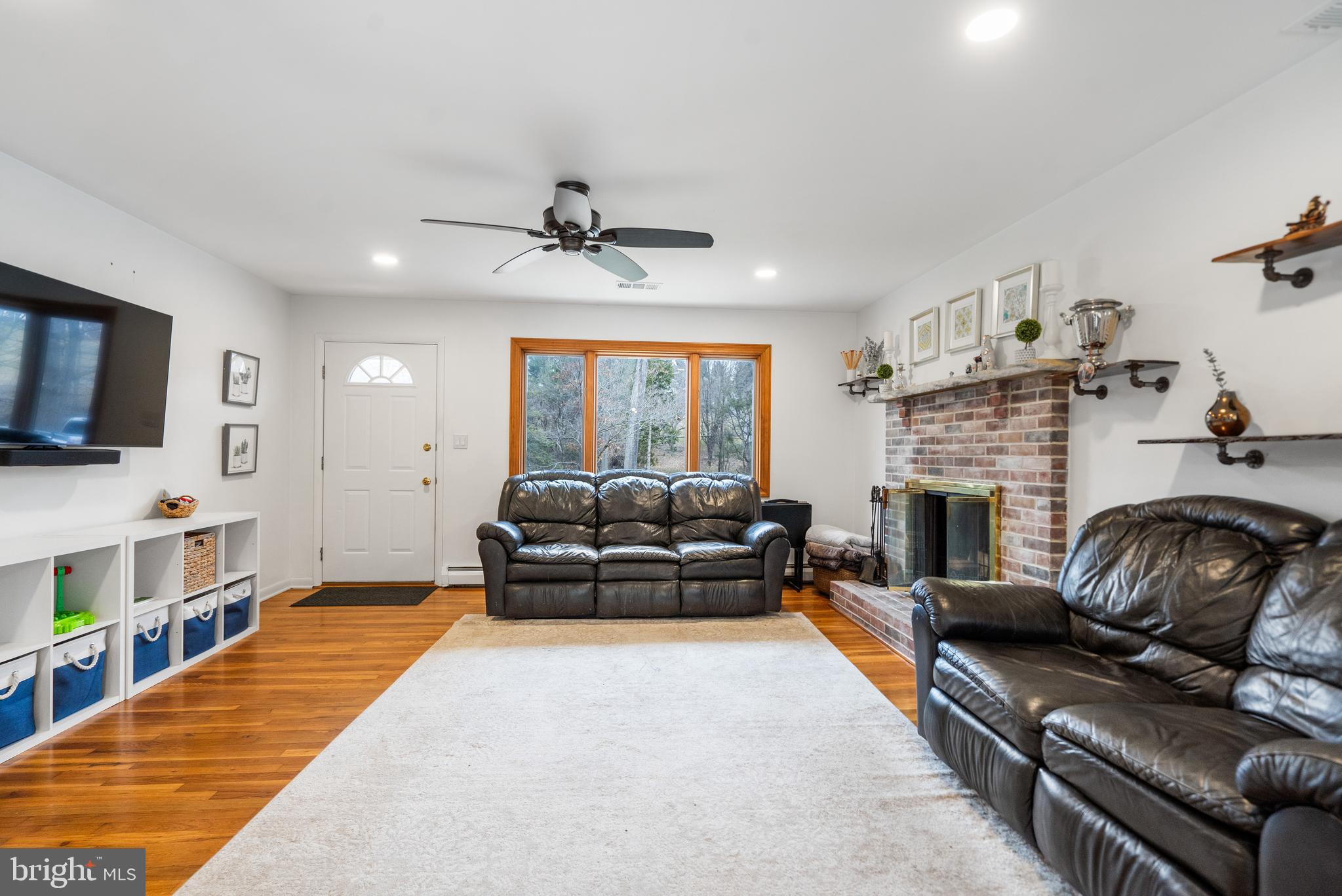 3605 Hoffman Mill Road Hampstead, MD 21074 - Photo 6 of 43 a living room with furniture and a fireplace