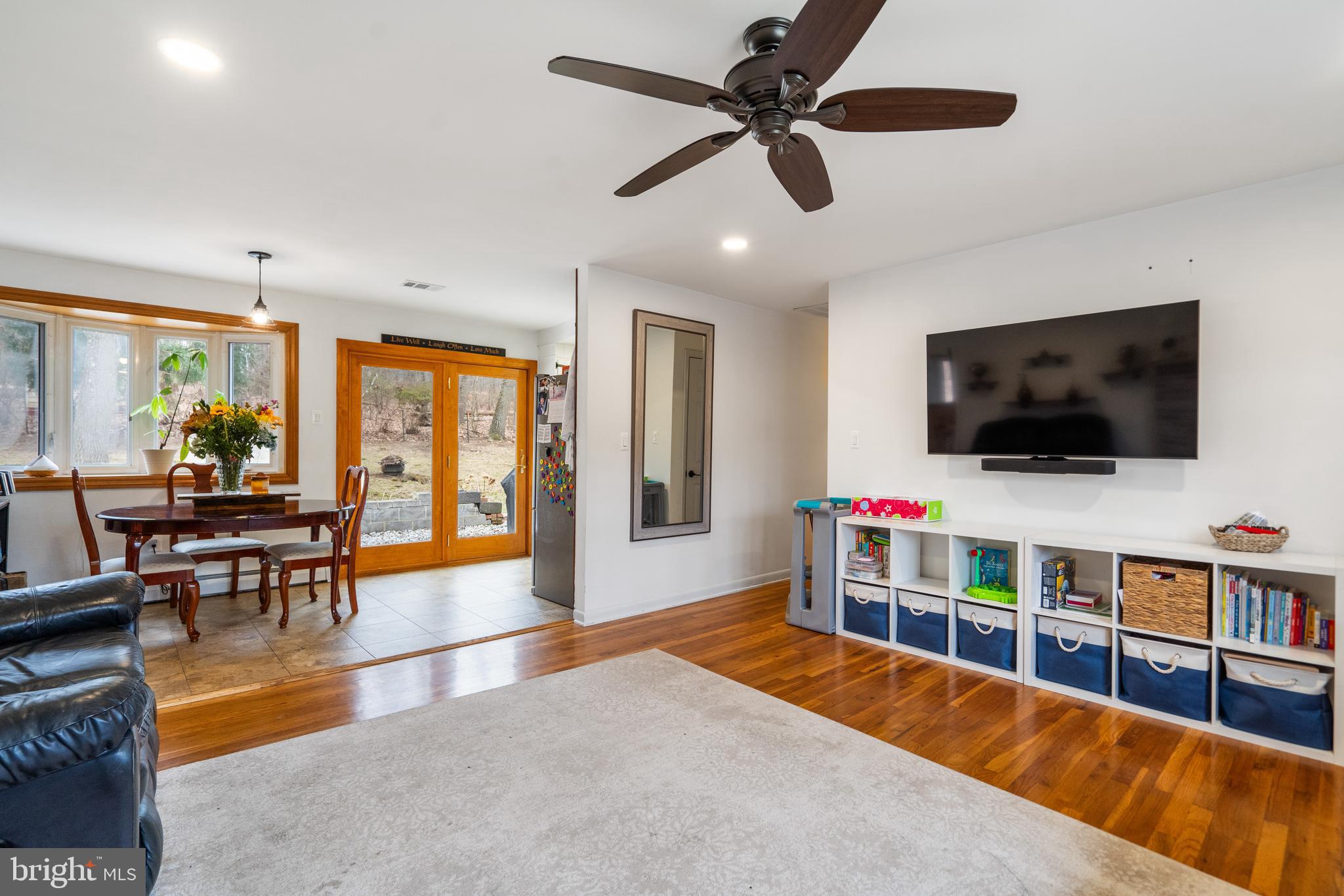 3605 Hoffman Mill Road Hampstead, MD 21074 - Photo 9 of 43 a living room with furniture and a flat screen tv