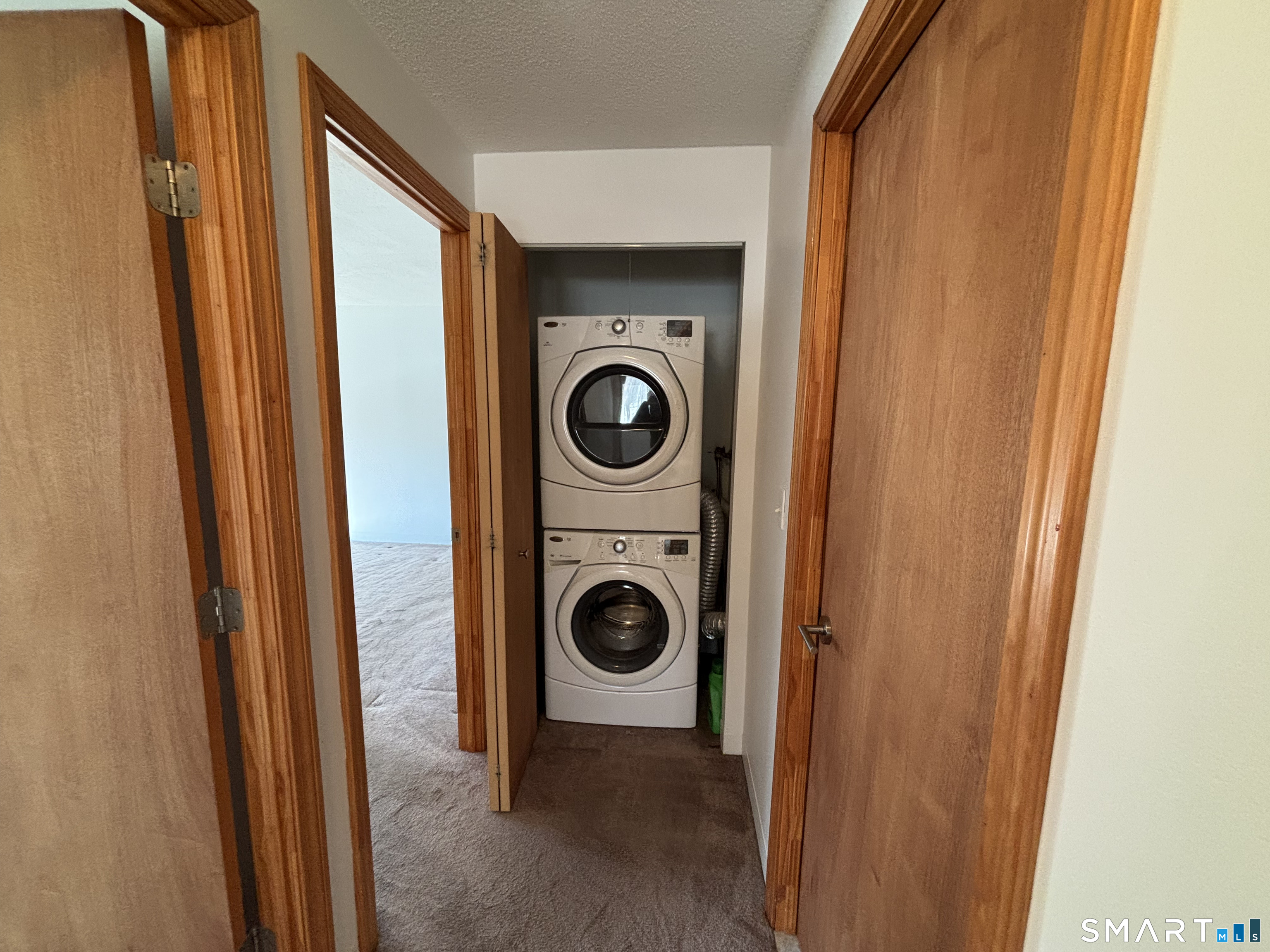 16 Putter Drive, Unit 207S Wallingford, CT 06492 - Photo 7 of 15 a view of washer and dryer in a utility room