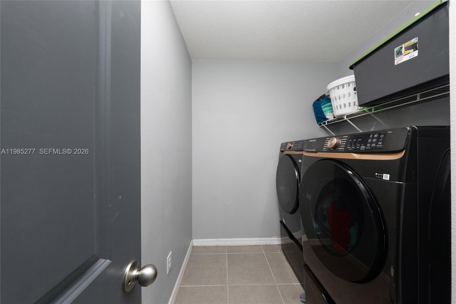 2824 Northeast 43rd Road Ocala, FL 34470 - Photo 23 of 45 a utility room with dryer and washer