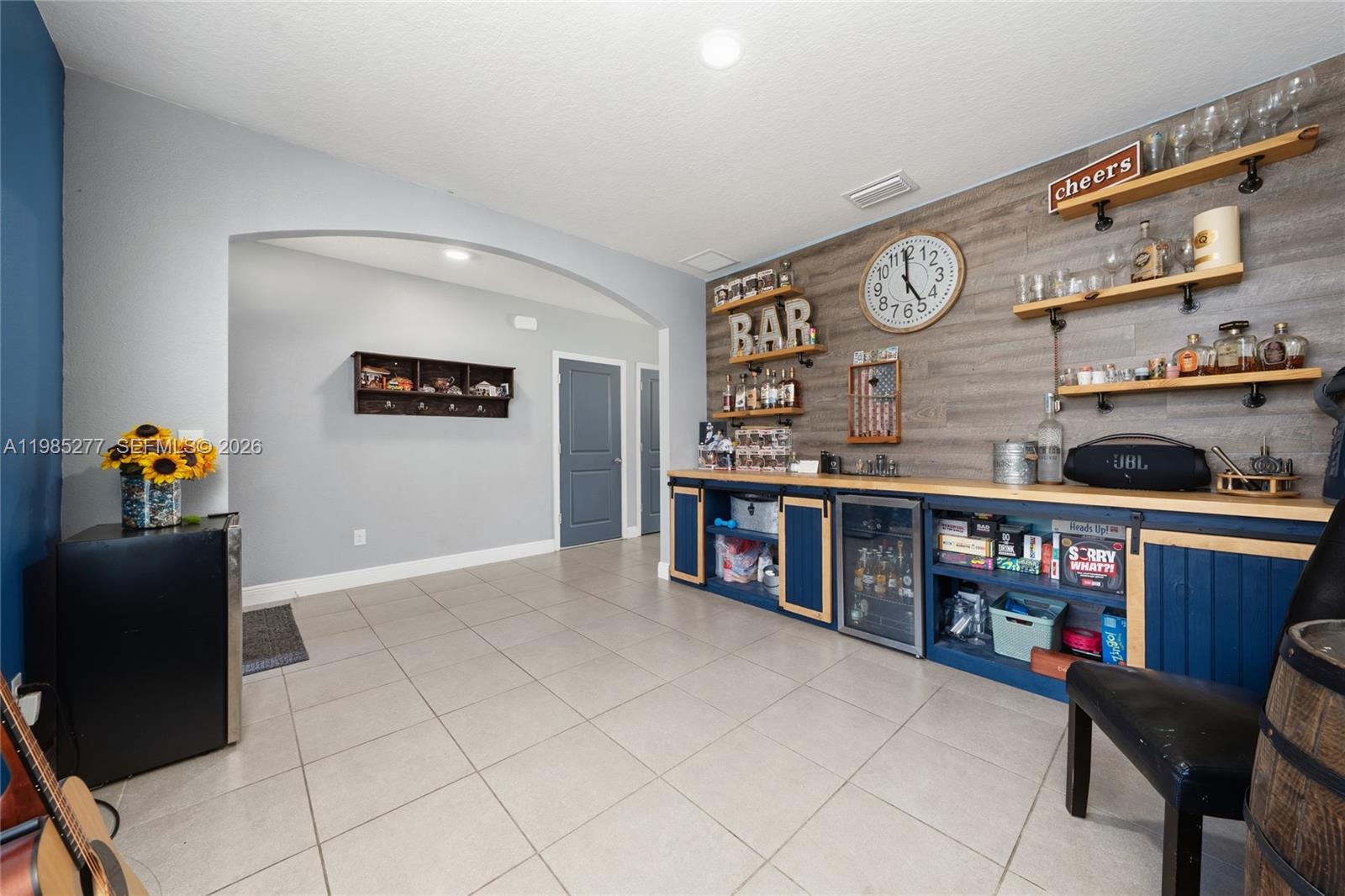 2824 Northeast 43rd Road Ocala, FL 34470 - Photo 6 of 45 a living room with furniture cabinets and window