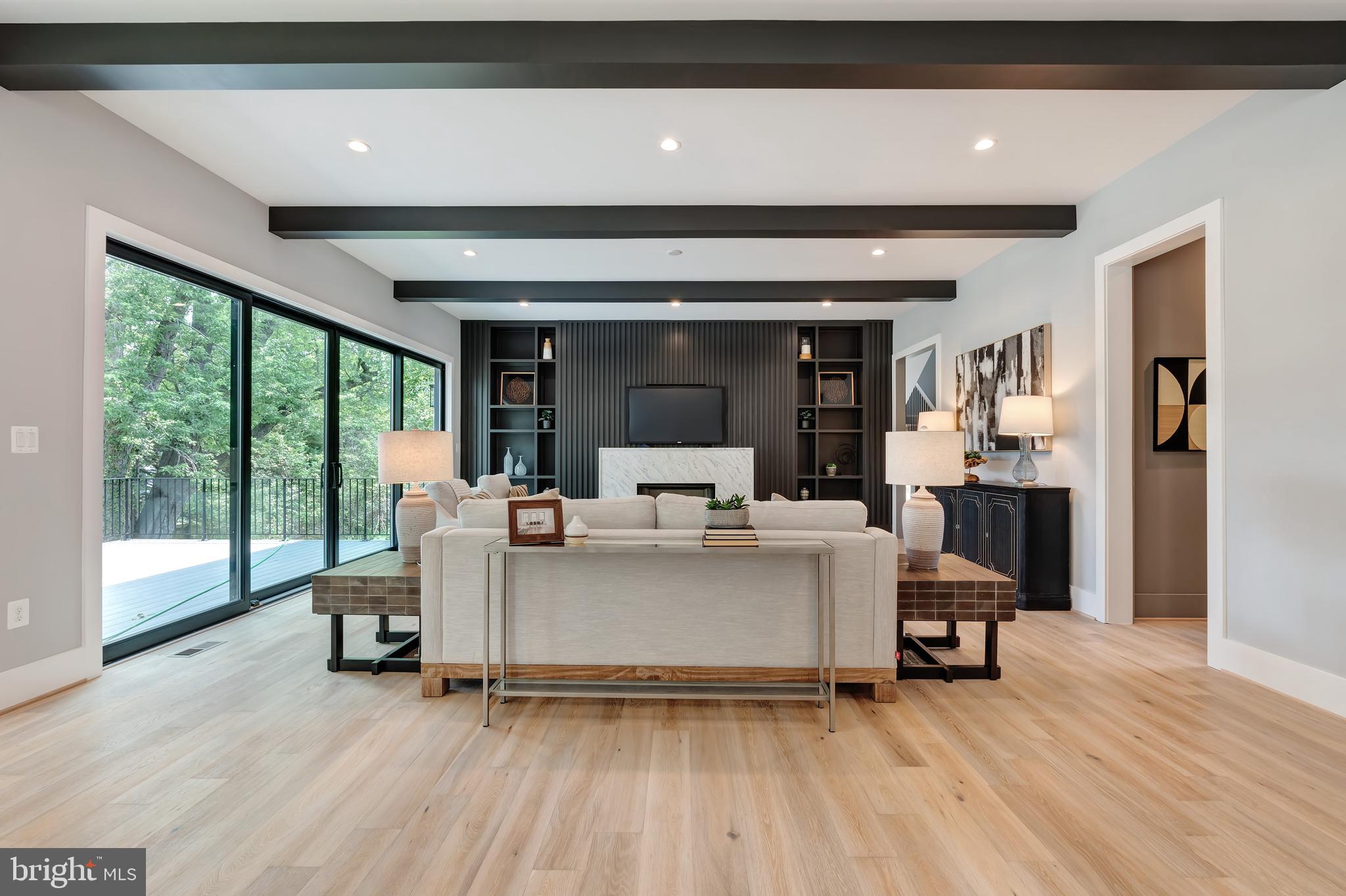 6800 Old Chesterbrook Road McLean, VA 22101 - Photo 12 of 44 a living room with furniture and a large window