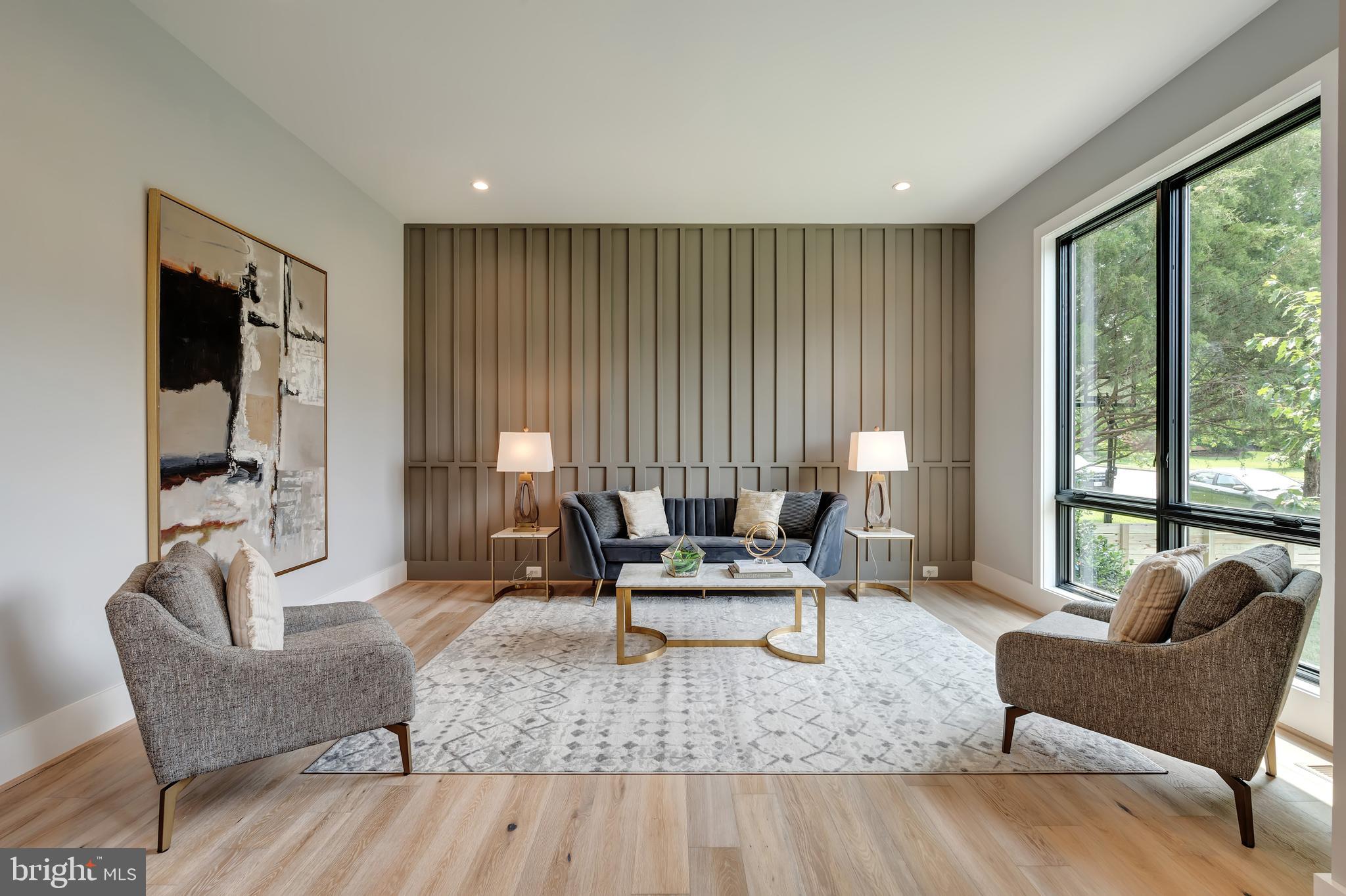 6800 Old Chesterbrook Road McLean, VA 22101 - Photo 3 of 44 a living room with furniture and a large window