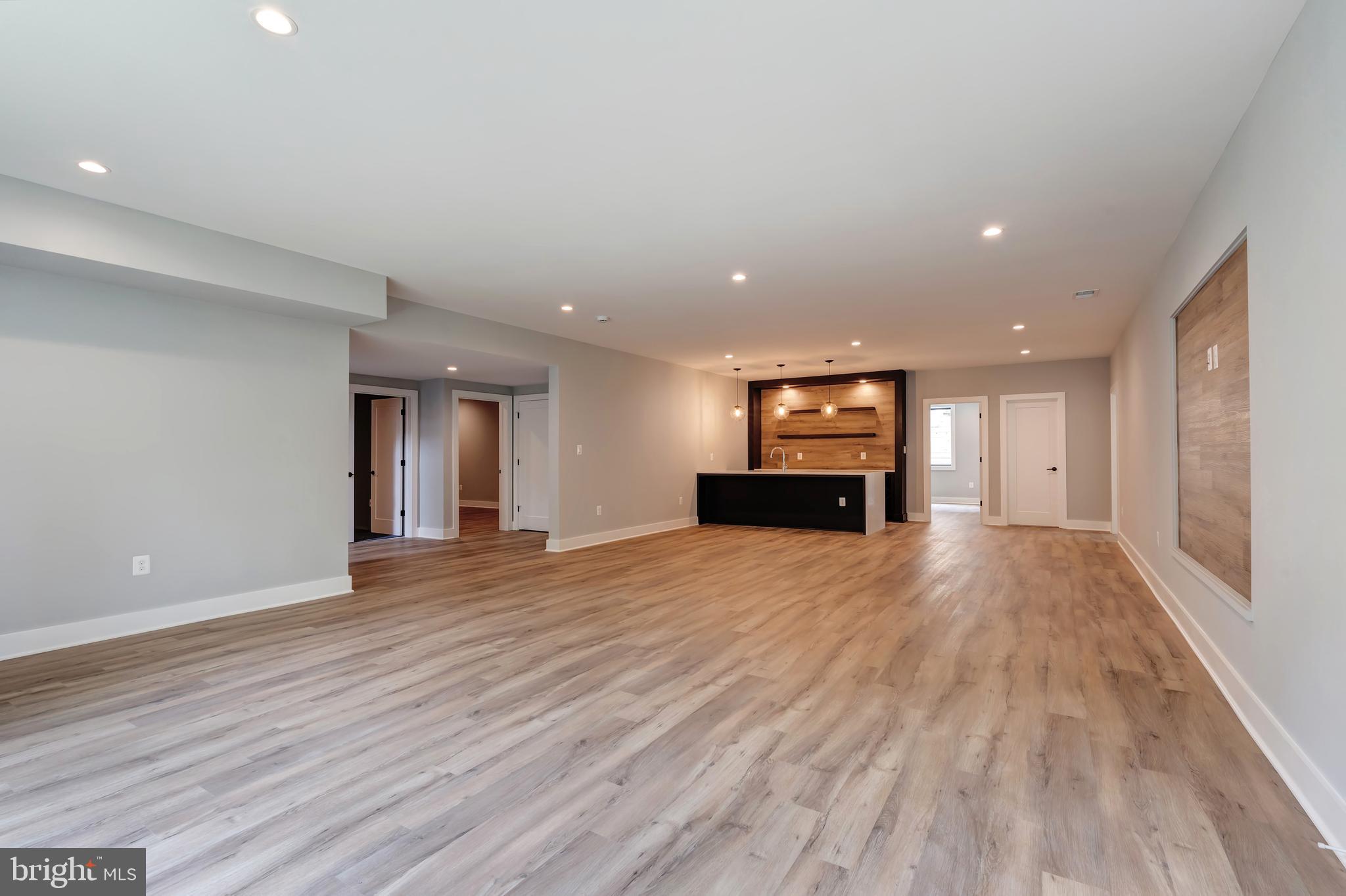 6800 Old Chesterbrook Road McLean, VA 22101 - Photo 36 of 44 a view of empty room with wooden floor and fireplace