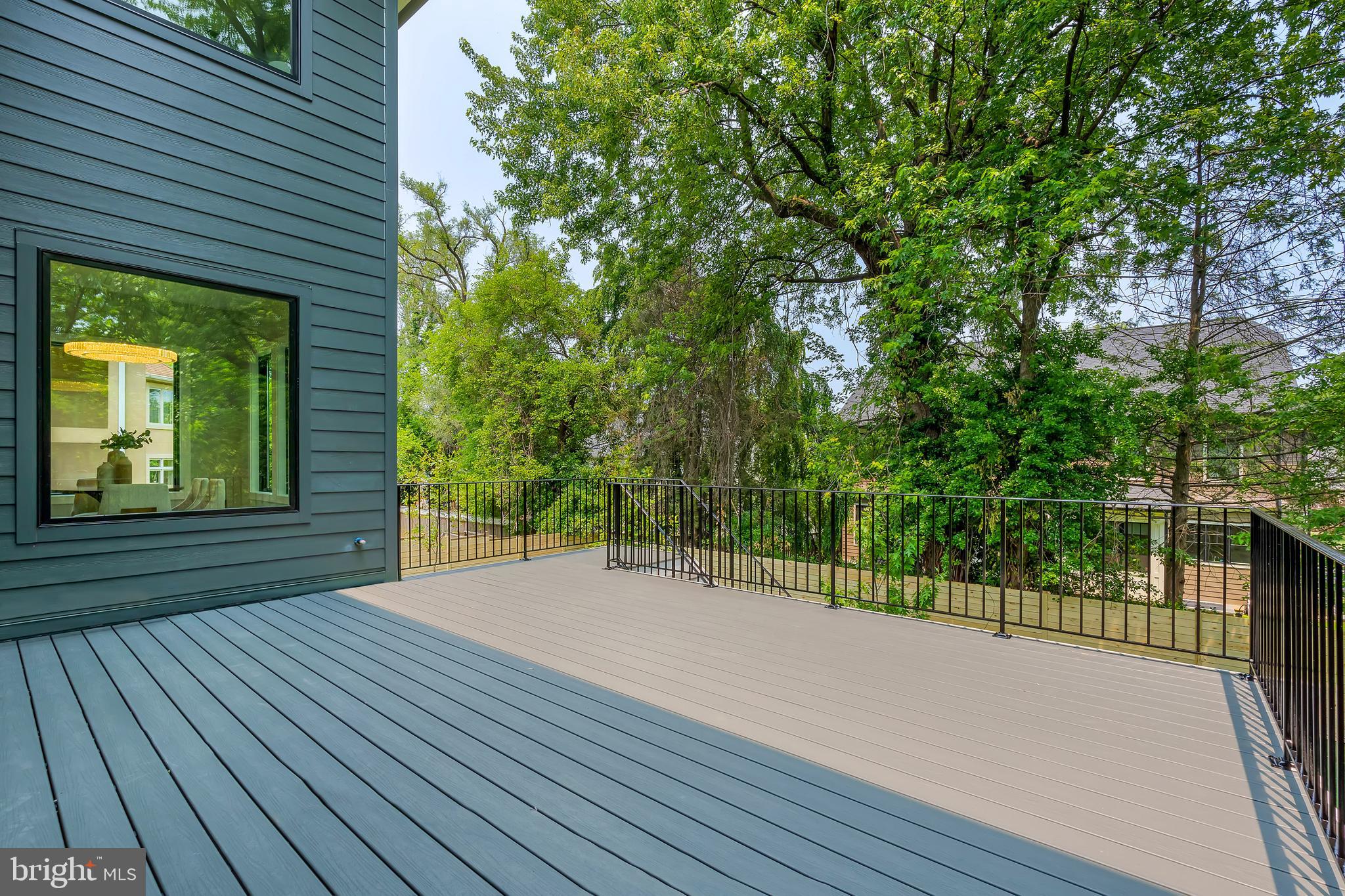 6800 Old Chesterbrook Road McLean, VA 22101 - Photo 42 of 44 a view of a room with wooden floor and fence