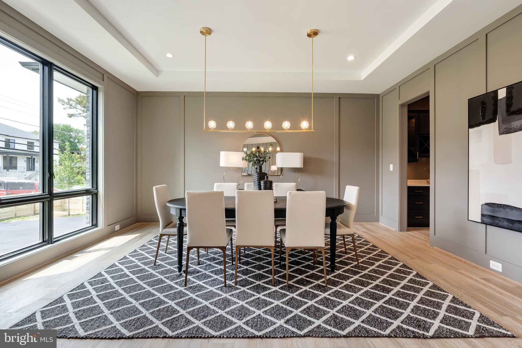 6800 Old Chesterbrook Road McLean, VA 22101 - Photo 6 of 44 a dining room with furniture a chandelier and window