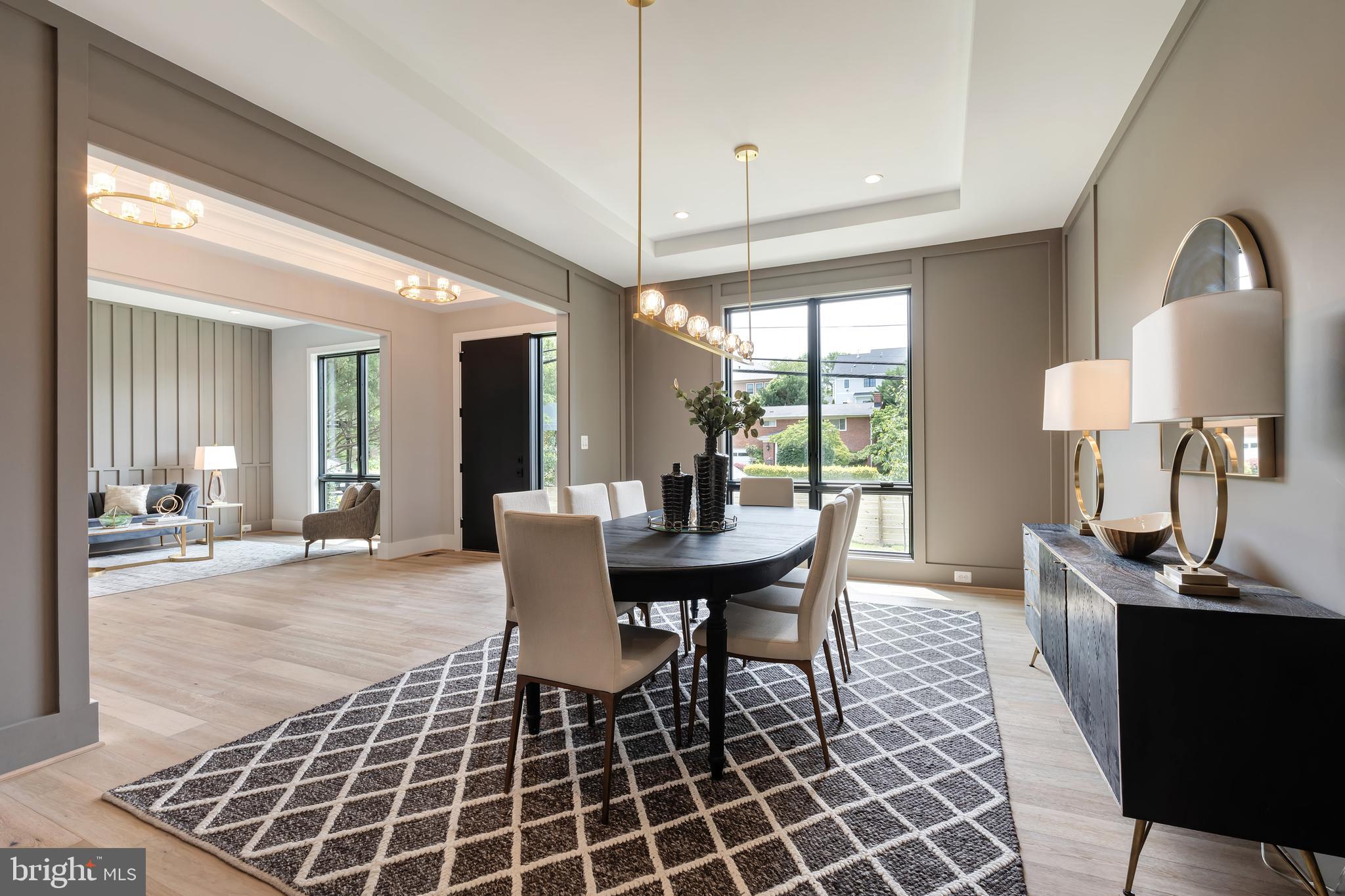 6800 Old Chesterbrook Road McLean, VA 22101 - Photo 7 of 44 a dining room with furniture a chandelier and window