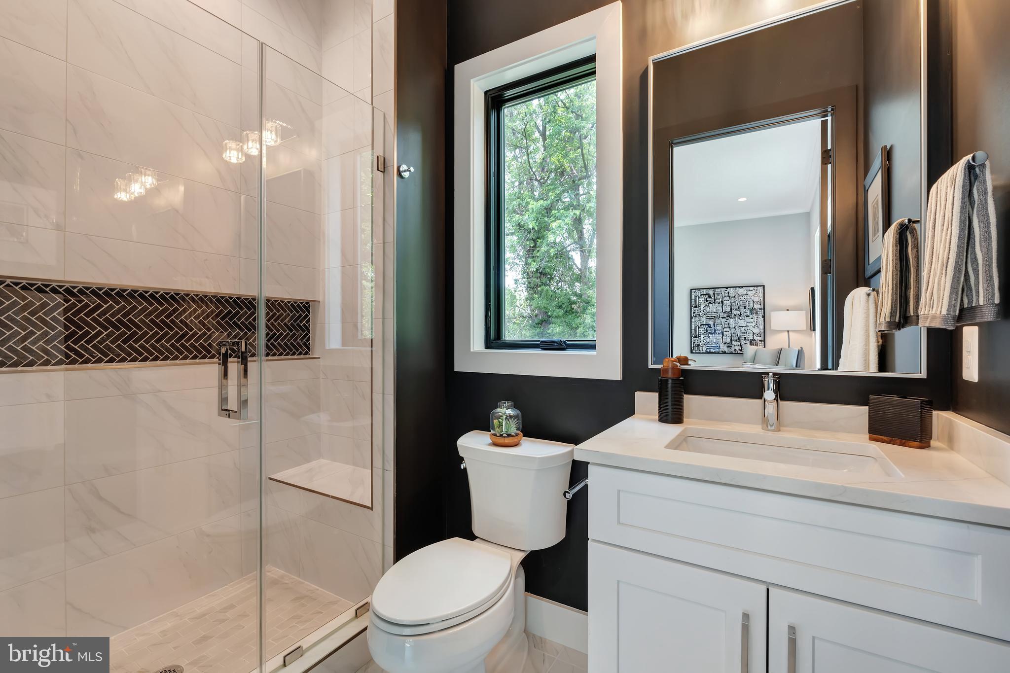 6800 Old Chesterbrook Road McLean, VA 22101 - Photo 8 of 44 a bathroom with a sink toilet and shower