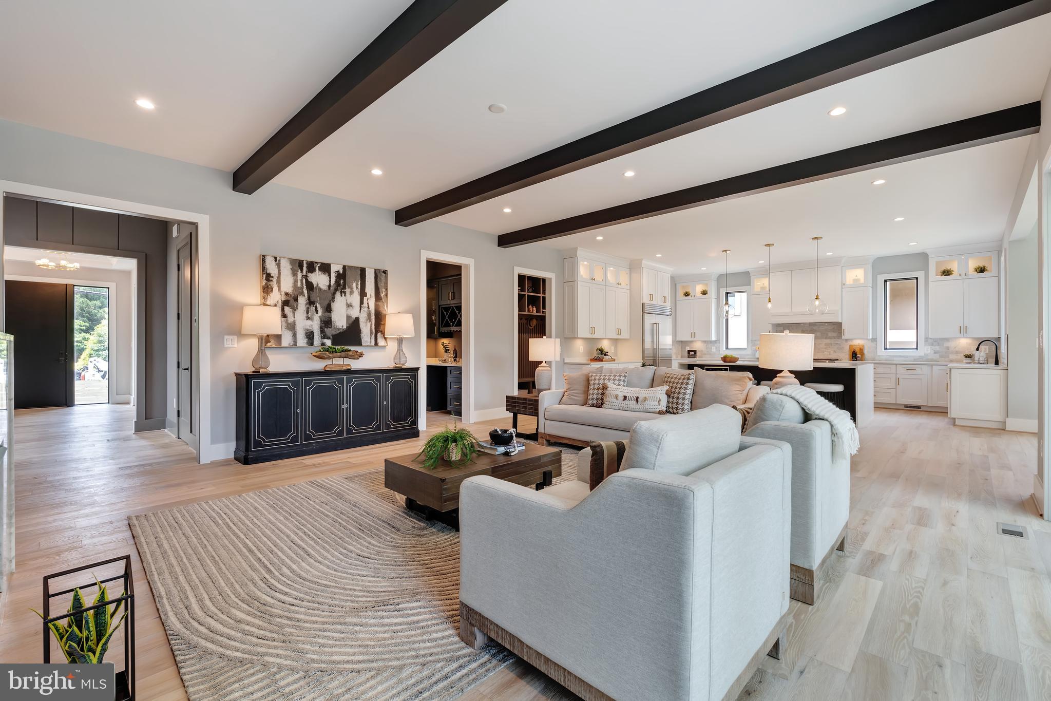 6800 Old Chesterbrook Road McLean, VA 22101 - Photo 10 of 44 a living room with furniture wooden floor and a large window