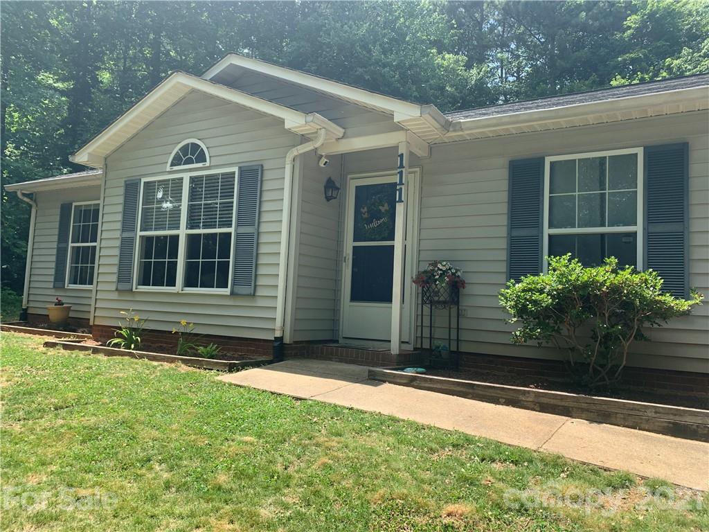 111 Creek View Road Mooresville, NC 28117 - Photo 2 of 25 a front view of a house with a yard