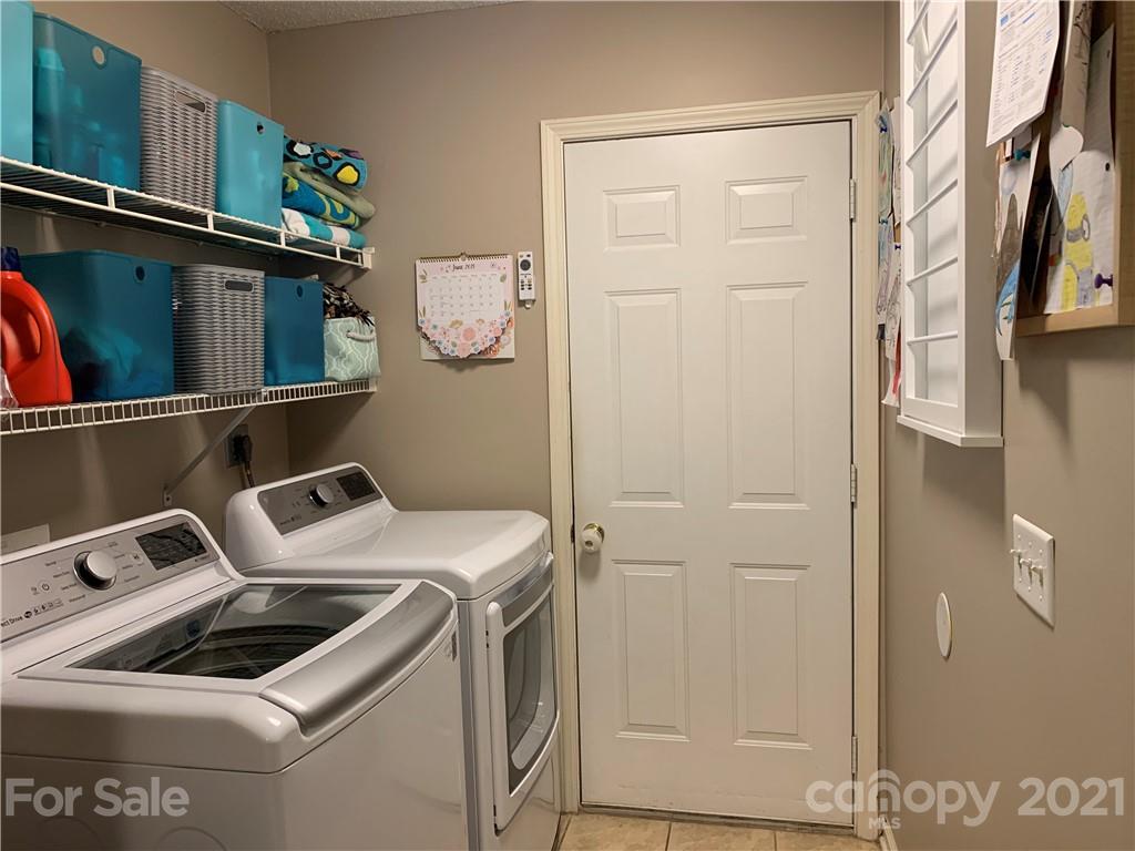 111 Creek View Road Mooresville, NC 28117 - Photo 13 of 25 a utility room with dryer and washer