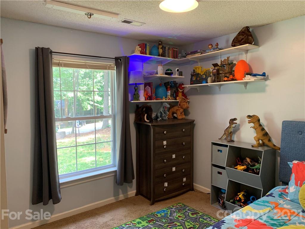 111 Creek View Road Mooresville, NC 28117 - Photo 21 of 25 a view of room with toys and a window