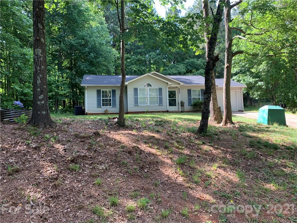 111 Creek View Road Mooresville, NC 28117 - Photo 4 of 25 a front view of a house with a yard