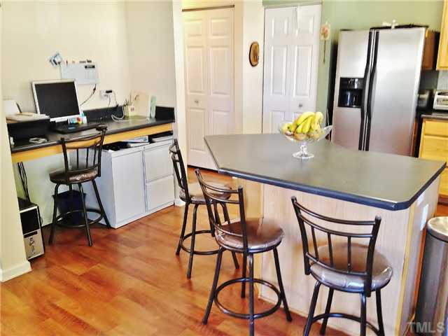 4113 Palafox Court Raleigh, NC 27604 - Photo 13 of 25 a view of a dining room with furniture and a window