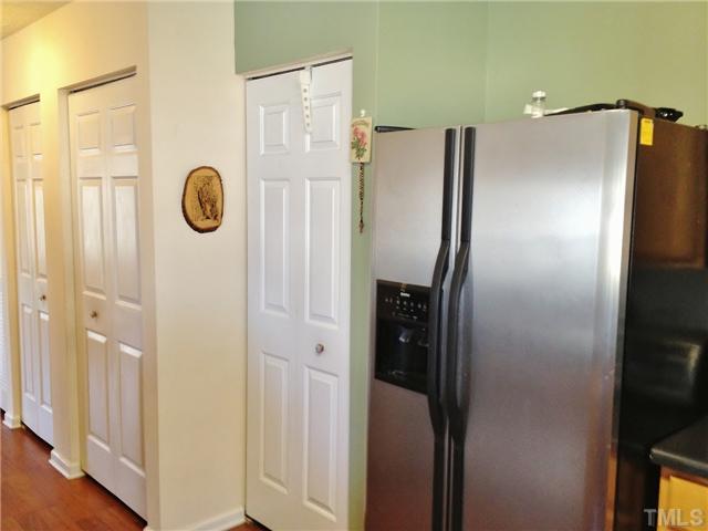 4113 Palafox Court Raleigh, NC 27604 - Photo 14 of 25 a view of walk in closet with wooden floor