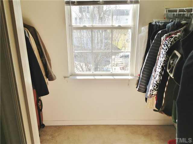 4113 Palafox Court Raleigh, NC 27604 - Photo 20 of 25 a view of walk in closet with clothes and shoes