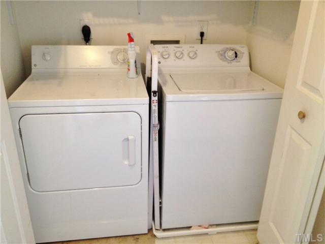 4113 Palafox Court Raleigh, NC 27604 - Photo 22 of 25 a utility room with dryer and washer