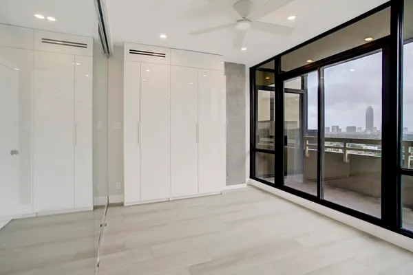 a view of an empty room and window