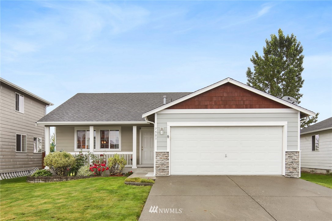 7503 Seashell Way Blaine, WA 98230 - Photo 2 of 31 a front view of a house with a yard