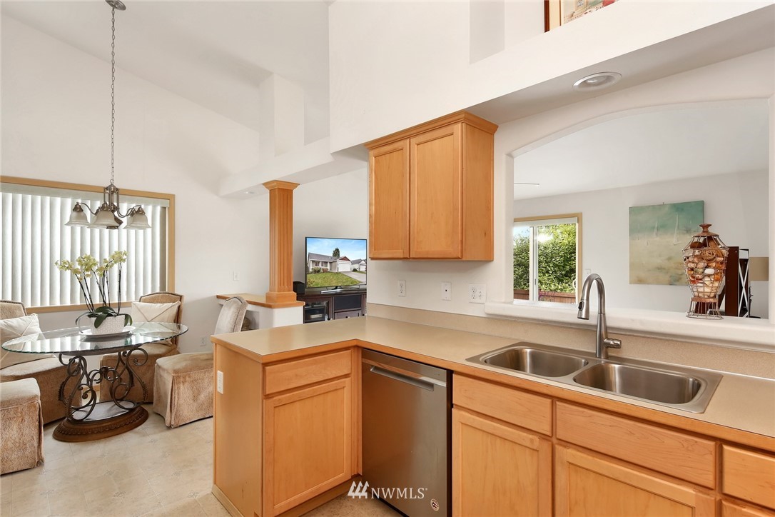 7503 Seashell Way Blaine, WA 98230 - Photo 15 of 31 a kitchen that has a sink and cabinets