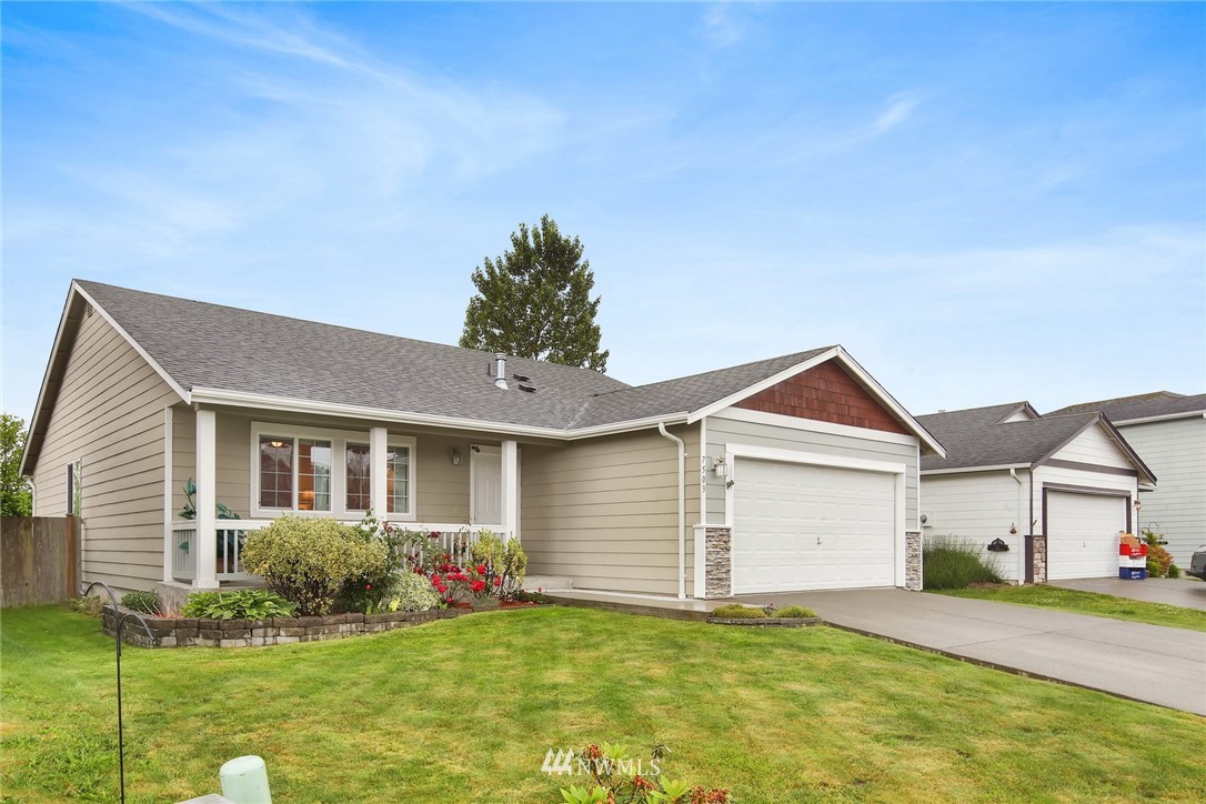 7503 Seashell Way Blaine, WA 98230 - Photo 3 of 31 a front view of a house with a yard