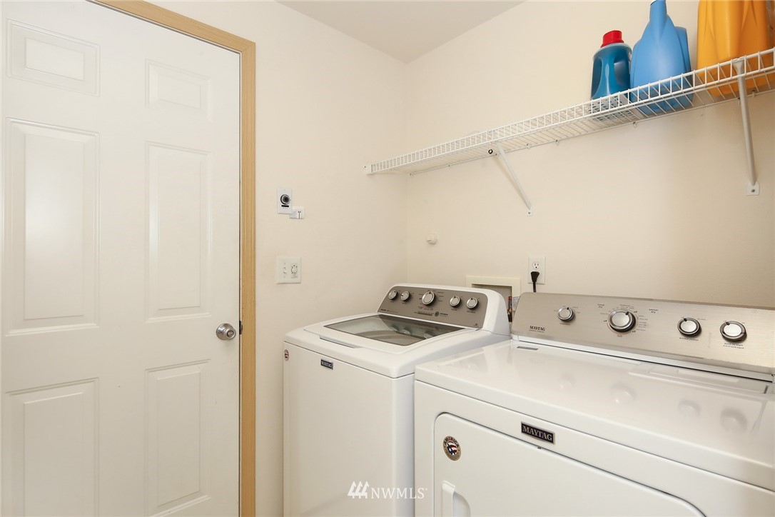7503 Seashell Way Blaine, WA 98230 - Photo 26 of 31 a utility room with dryer and washer