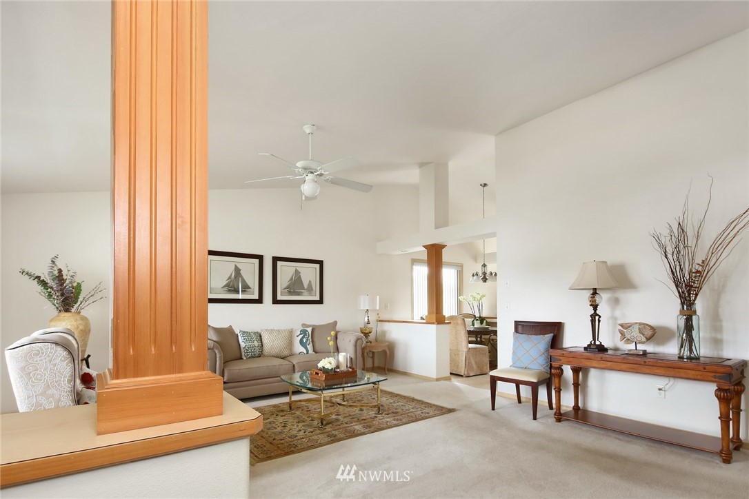 7503 Seashell Way Blaine, WA 98230 - Photo 4 of 31 a living room with furniture and a table