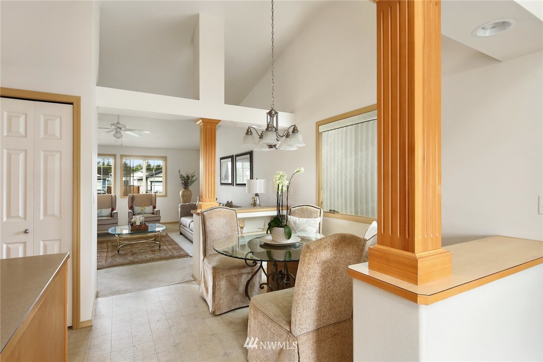 7503 Seashell Way Blaine, WA 98230 - Photo 9 of 31 a view of a dining room with furniture window and outside view