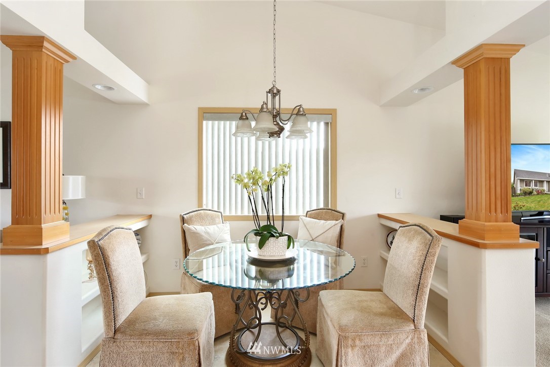 7503 Seashell Way Blaine, WA 98230 - Photo 10 of 31 a view of a dining room with furniture window and outside view