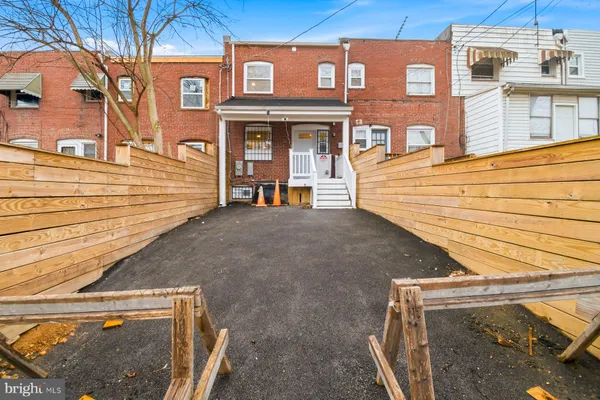 a view of a building with a street