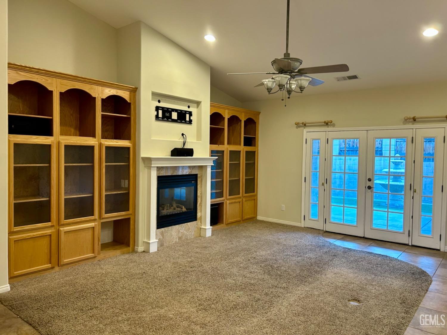 Undisclosed Address Taft, CA 93268 - Photo 13 of 27 a view of a livingroom with furniture and a ceiling fan