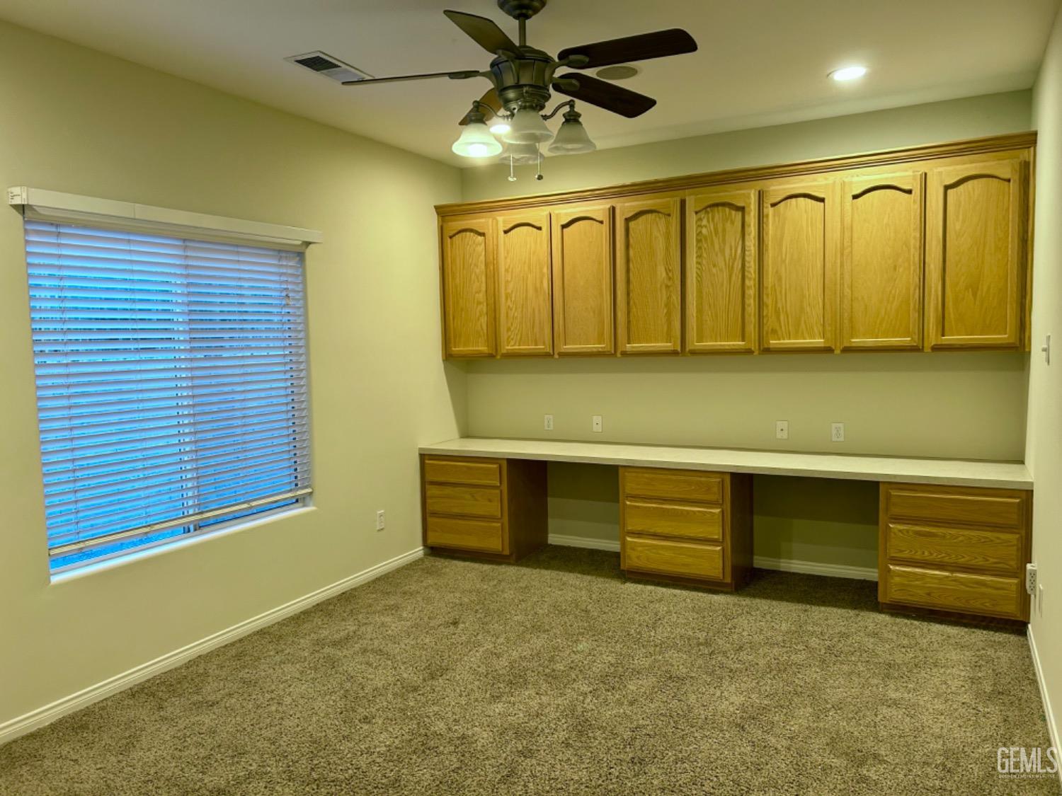 Undisclosed Address Taft, CA 93268 - Photo 22 of 27 a room with furniture and a ceiling fan