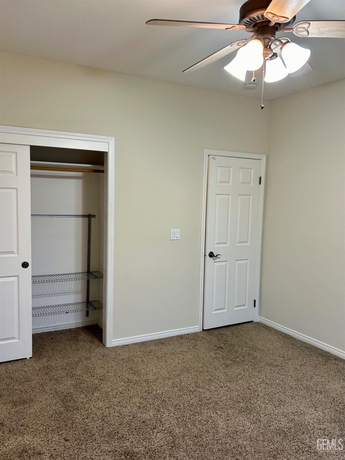 Undisclosed Address Taft, CA 93268 - Photo 24 of 27 wooden floor in an empty room with a window