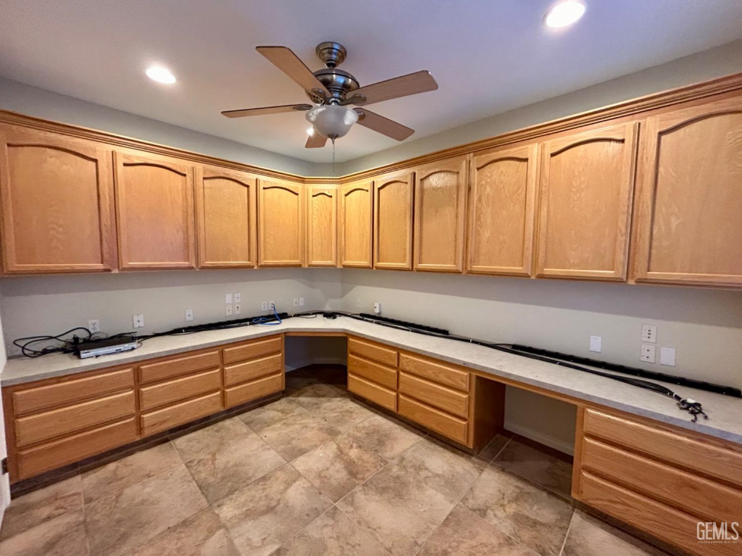 Undisclosed Address Taft, CA 93268 - Photo 25 of 27 a kitchen with granite countertop cabinets stainless steel appliances and a window
