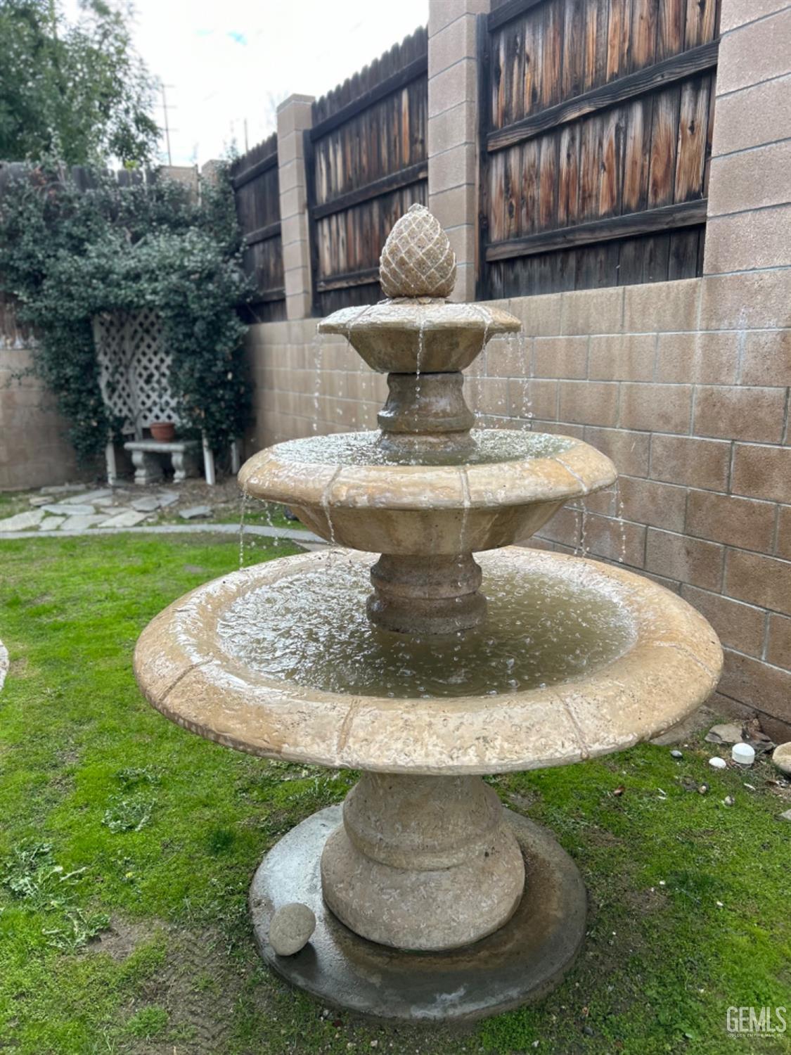 Undisclosed Address Taft, CA 93268 - Photo 6 of 27 a view of a water fountain in the back yard of a house