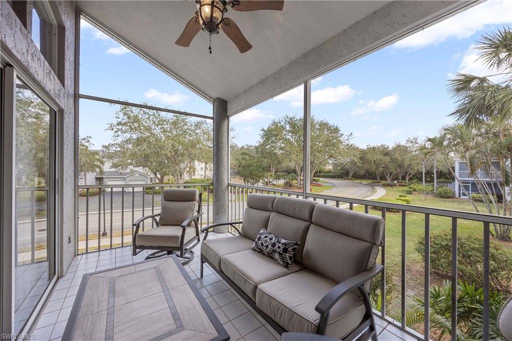 2860 Citrus Lake Drive, Unit R204 Naples, FL 34109 - Photo 17 of 32 Sunroom / solarium featuring ceiling fan and vaulted ceiling