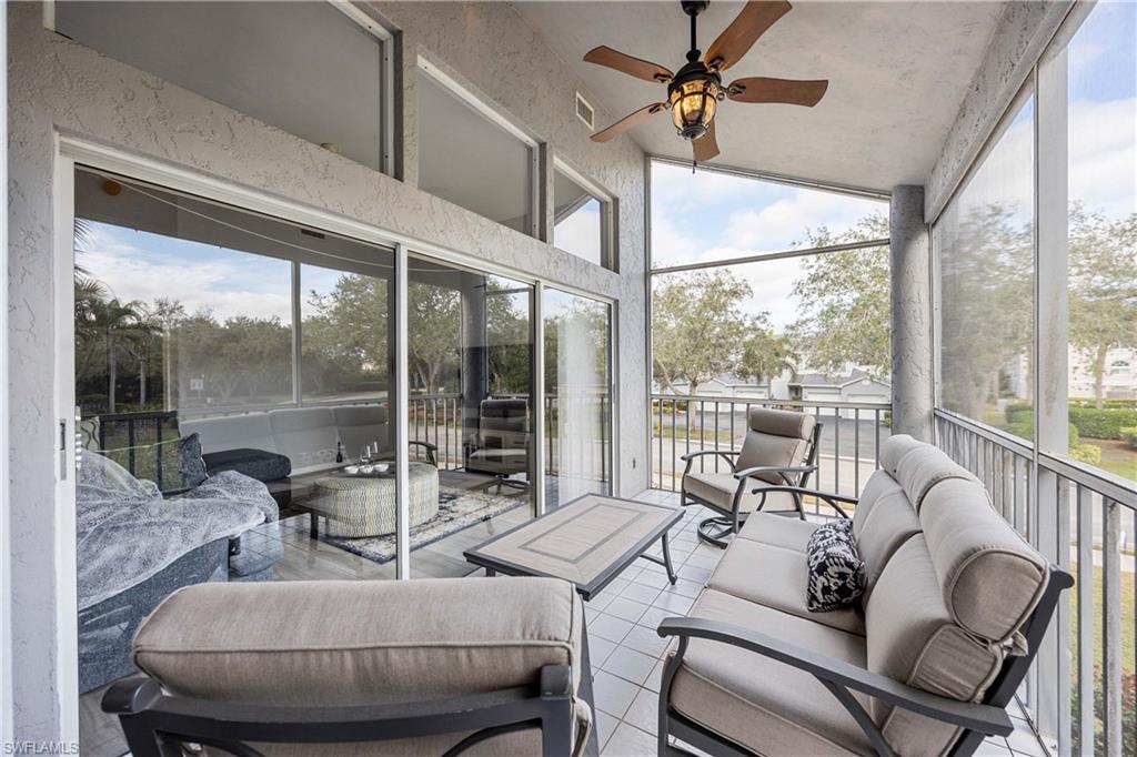 2860 Citrus Lake Drive, Unit R204 Naples, FL 34109 - Photo 18 of 32 Sunroom / solarium with ceiling fan