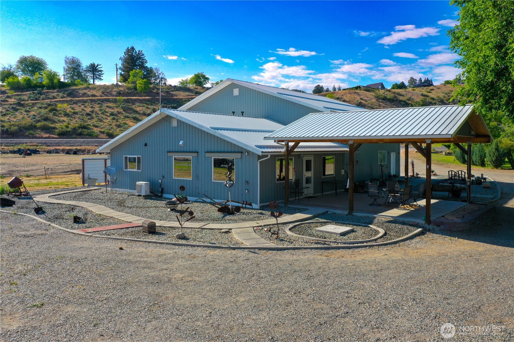 46 Shumway Road Omak, WA 98841 - Photo 2 of 40 a front view of house with yard patio and outdoor seating