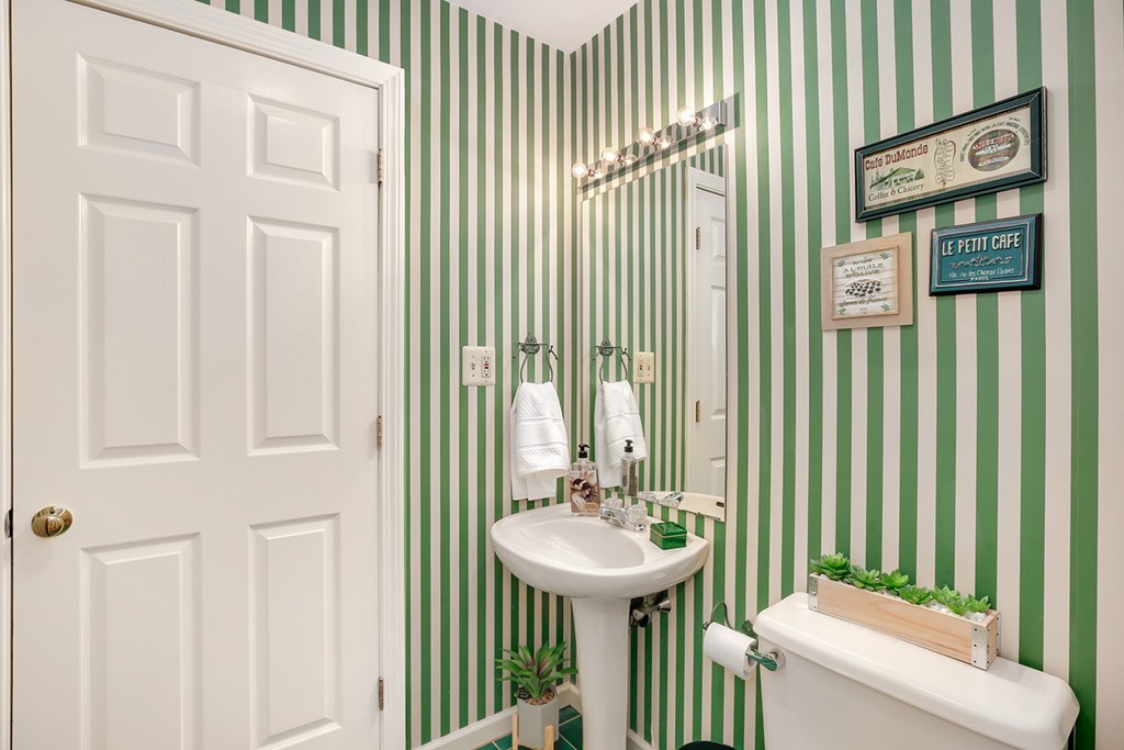 830 Worcester Street Wellesley, MA 02482 - Photo 11 of 30 a bathroom with a sink and a mirror