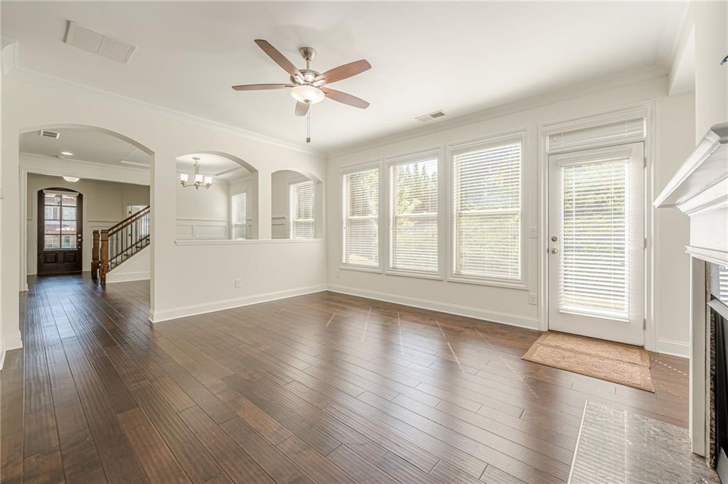 1040 Peyton View Court Alpharetta, GA 30004 - Photo 20 of 53 a view of an empty room with wooden floor and a window