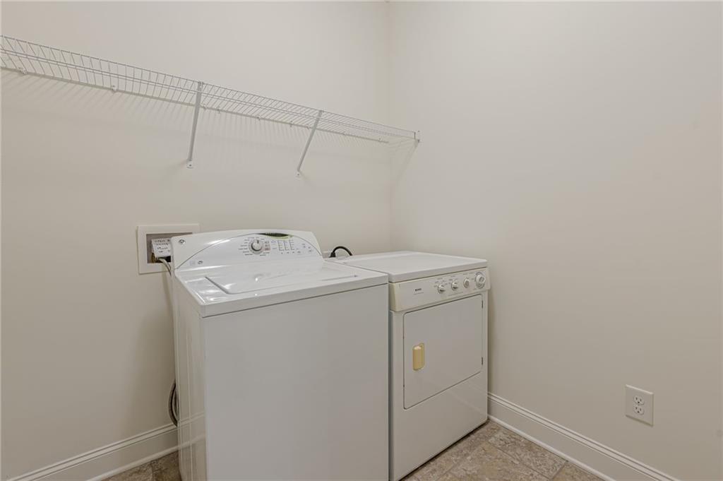 1040 Peyton View Court Alpharetta, GA 30004 - Photo 29 of 53 a utility room with dryer and washer