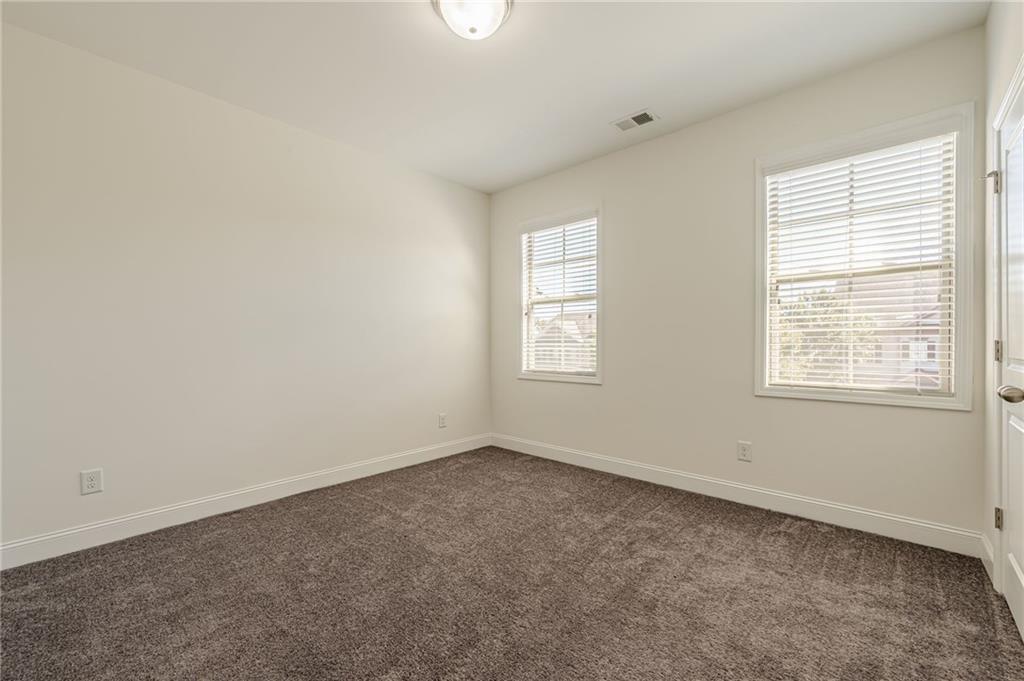 1040 Peyton View Court Alpharetta, GA 30004 - Photo 33 of 53 an empty room with a window