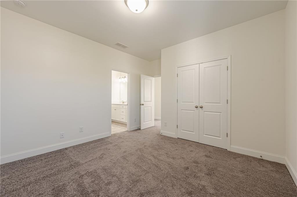 1040 Peyton View Court Alpharetta, GA 30004 - Photo 39 of 53 a view of an empty room and closet area