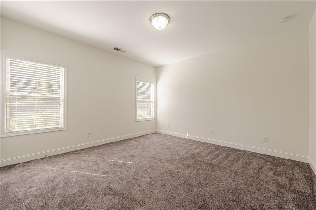 1040 Peyton View Court Alpharetta, GA 30004 - Photo 41 of 53 an empty room with windows