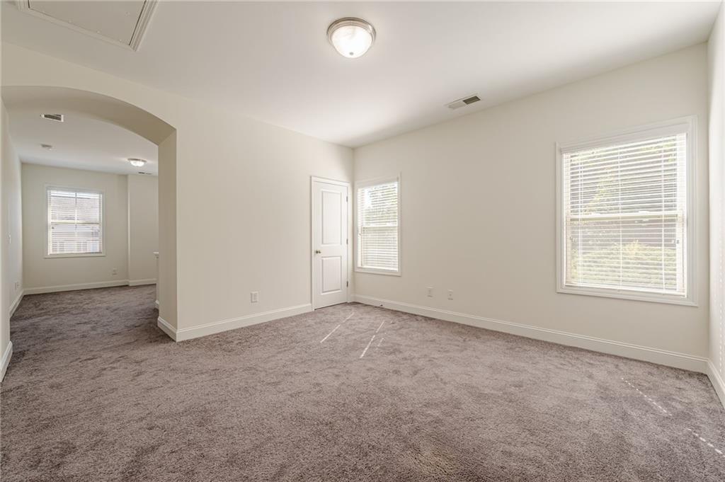 1040 Peyton View Court Alpharetta, GA 30004 - Photo 43 of 53 an empty room with windows