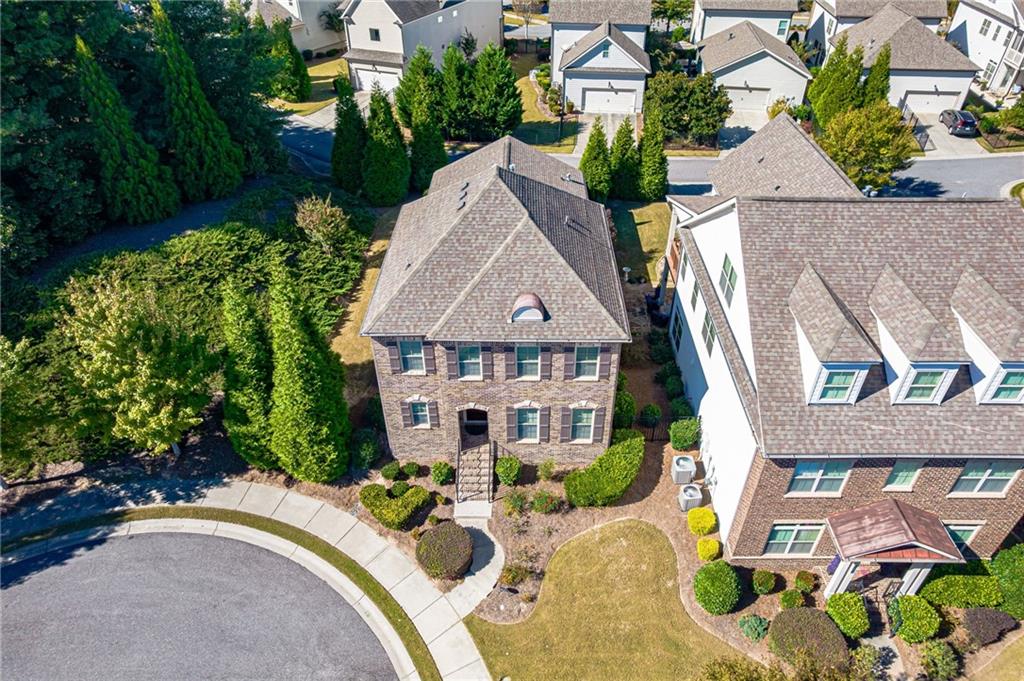 1040 Peyton View Court Alpharetta, GA 30004 - Photo 49 of 53 an aerial view of a house with yard and green space